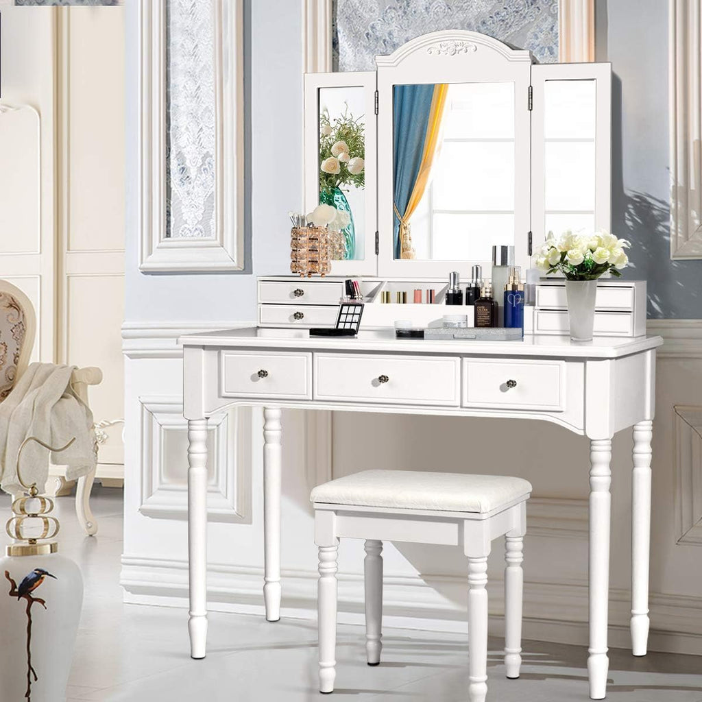 DORTALA Makeup Vanity Table Set w/ 7 Drawers, Removable Tri-Folding Mirror w/ 8 Jewelry Necklace Hooks, Dressing Table w/Open Storage Box & Cushioned Stool, Solid Wood Legs,White