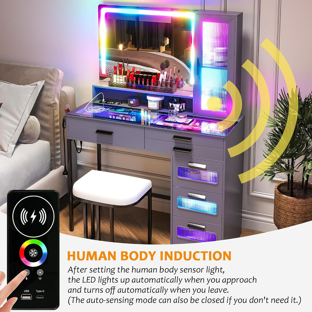 WOOVIVS Vanity with LED Mirror, Makeup Desk with 24 RGB Atuo Lighted Drawers for Bedroom, Glass Top Vanities Table Set with Wireless Charging Station, Chair,Jewelry Organizer for Girls/Women (Grey)