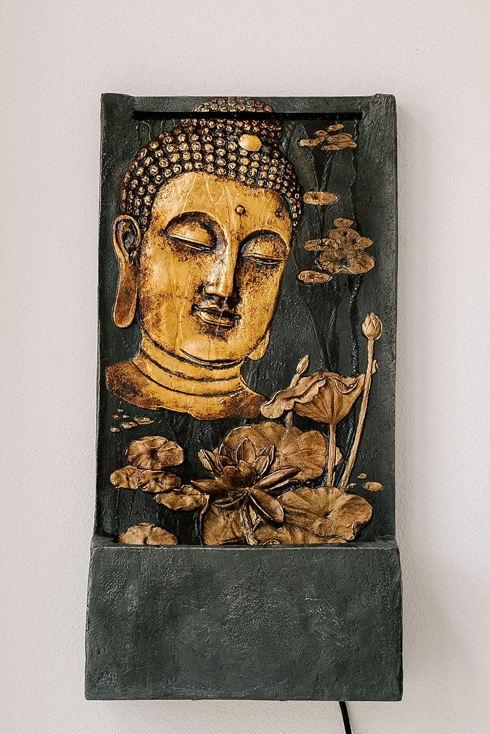 XBrand Polystone Indoor Outdoor Relaxing Zen Buddha Face Wall Water Fountain with Pump and Splash Guard, Wall-Mounted Fountains, Home Garden Patio Backyard Decor, Bronze and Natural Stone Finish